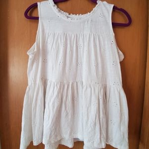 White sleeveless shirt